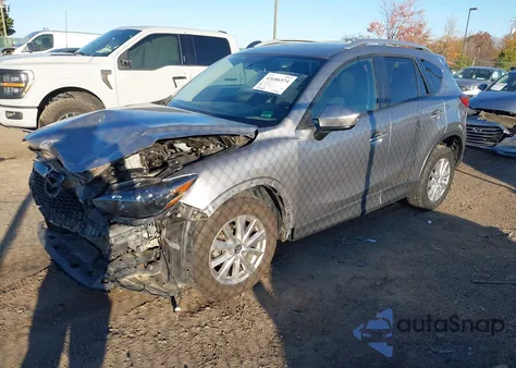 2014 Mazda Cx-5 Touring z USA, uszkodzony, nr VIN JM3KE4CY3E0393283